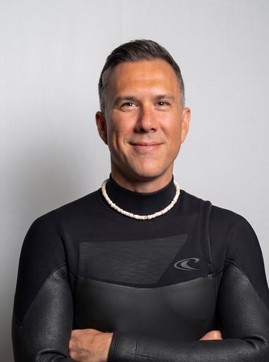 Timothy Kroon in a wetsuit, ready for a surf